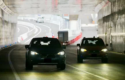 Real-World Demonstration Tests of Cooperative Vehicle-Infrastructure Autonomous Driving Using Optical Fiber Sensing Technology